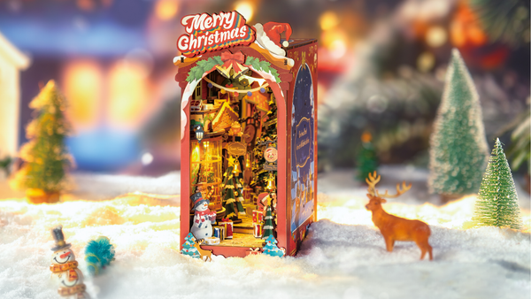 Gezellig kerststraatje bouwen met Monique met een book nook houten bouwpakket
