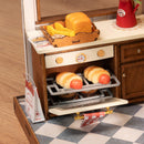 Open oven met broodjes in de Robotime Baking Kitchen