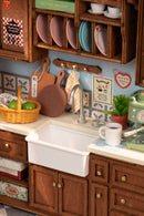 Detail van het aanrechtblad en gootsteen va de Robotime Baking Kitchen