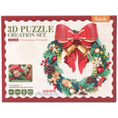 Voorkant verpakking van de Robotime Christmas Wreath, houten bouwpakket van een kerstkrans