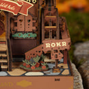 Close-up van het ROKR-bord van de Robotime Cuckoo Clock