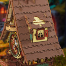 Close-up van de dakkapel van de Robotime Cuckoo Clock