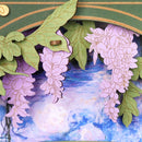 Close-up van hangende bloemen en schilderachtige achtergrond van de Robotime Glittering Water Lily