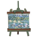Het kleine schildersezeltje met het beroemde Monet's waterlelies schilderij van de Robotime Glittering Water Lily