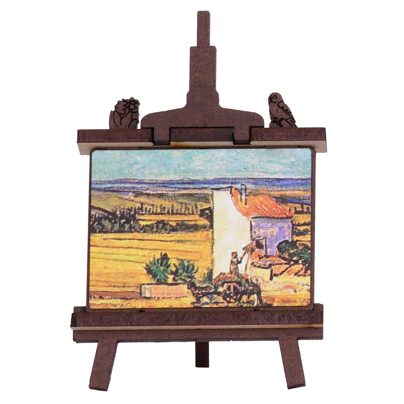 Het kleine schildersezeltje met het beroemde van Gogh's De Oogst schilderij, van de Robotime Golden Sunflower