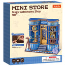 Voorkant verpakking van de Robotime Magic Astronomy Shop, bouwpakket voor een miniatuurhuisje van een winkel in sterrenkunde