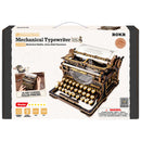 Voorkant verpakking van de Robotime Mechanical Typewriter (Classic Version), houten bouwpakket van zwart- en goudkleurige, functionerende typemachine