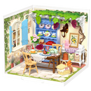 Productfoto van de Robotime Midsummer Dream Yard, kunststof miniatuur terras met gedekte tafel, pergola en meubelen