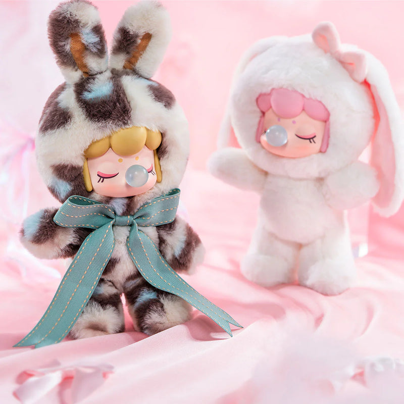 De luipaardprint en witte variant van de Robotime Nanci Shining Bunny, blind box van een schattig figuurtje in konijnenpak in verschillende kleuren