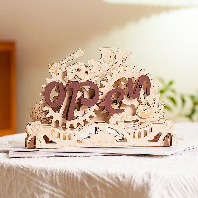 Sfeervolle presentatie van het Robotime Open Closed Sign, houten bouwpakket van een transformerend bordje
