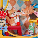 Spelende katten in de etalage van de Robotime Pawfect Pet Shop