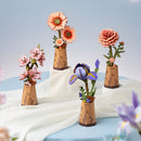De Robotime Purple Iris samen met de Pink Dahlia, Sakura en Light Orange Gerbera