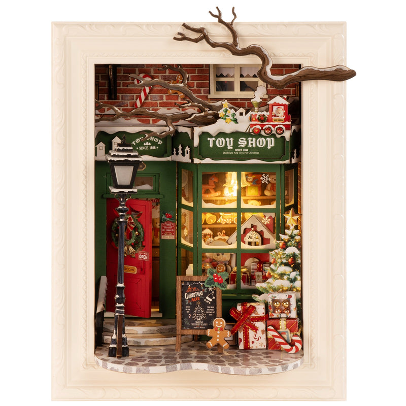 Productfoto van de Robotime Santa’s Toy Shop, diorama van een in kerstthema versierd winkeltje met lichtjes