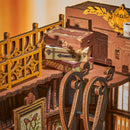 Close-up detail van de koffertjes bovenop de boekenkasten van de Robotime Silent Corner Study