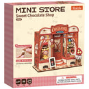 Voorkant verpakking van de Robotime Sweet Chocolate Shop, bouwpakket voor een miniatuurhuisje van een ouderwetse chocoladewinkel