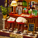 Details van de bar en de kruk met slapende kat in de Robotime Tipsy Cat Bar