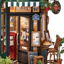 Details van een van de zitplaatsen en de ingang van de Robotime Tipsy Restaurant