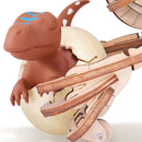 De net uit het ei gekomen dino in de klauwen van de Robotime Velociraptor