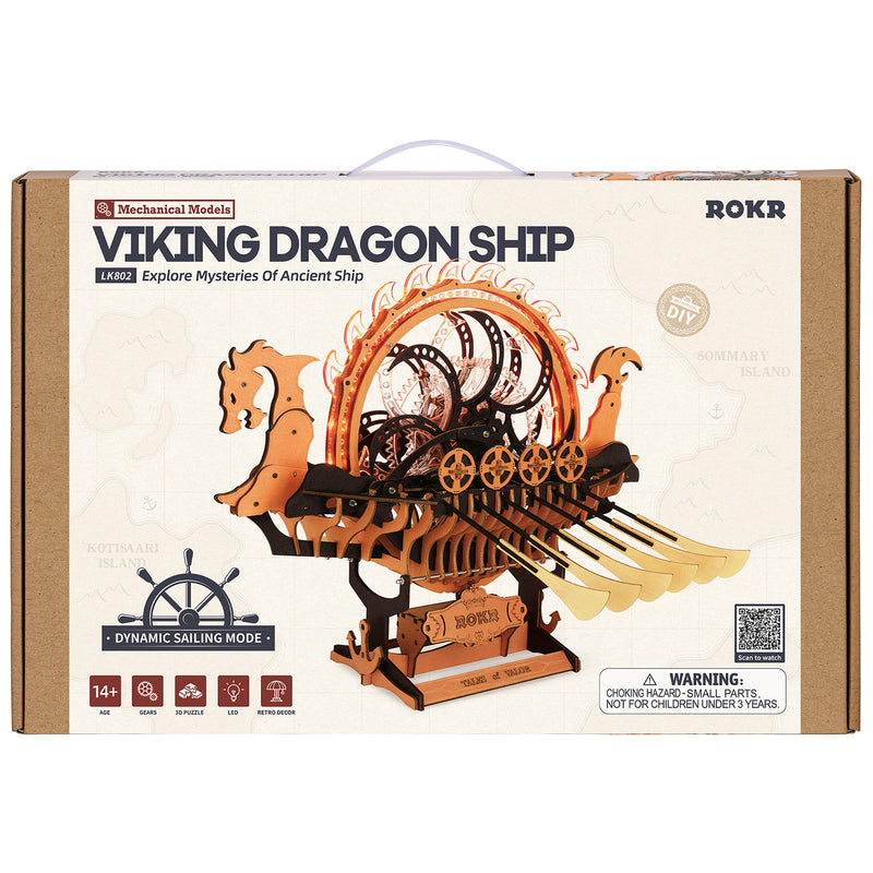 Voorkant verpakking van de Robotime Viking Dragon Ship, houten bouwpakket van een vikingschip met bewegende roeispanen en lichtgevend rad op het dek 