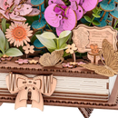 Close-up van het boek van de Robotime Wooden Blooming Book