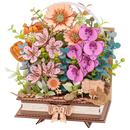 Productfoto van de Robotime Wooden Blooming Book, houten bouwpakket van een boeket bloemen op een gesloten boek