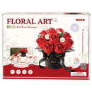 Voorkant verpakking van de Rolife Red Rose Bouquet, kunststof bouwpakket van een boeket rode rozen en witte madeliefjes in een zwarte vaas met zwart lintje erom
