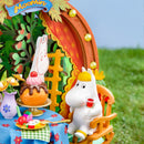 Snorkmaiden geniet van een drankje aan een gedekte tafel in de Rolife Snorkmaiden's Garden Party